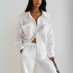 White button-up shirt and wide-leg pants set with side pockets, front view