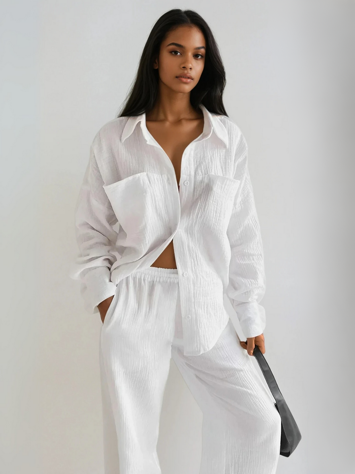 White button-up shirt and wide-leg pants set with side pockets, front view