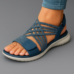 Orthopedic sandal in blue knit with open-toe design and cushioned sole.