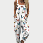 Loose-fit white overalls with colorful animal print, wide straps and bib front