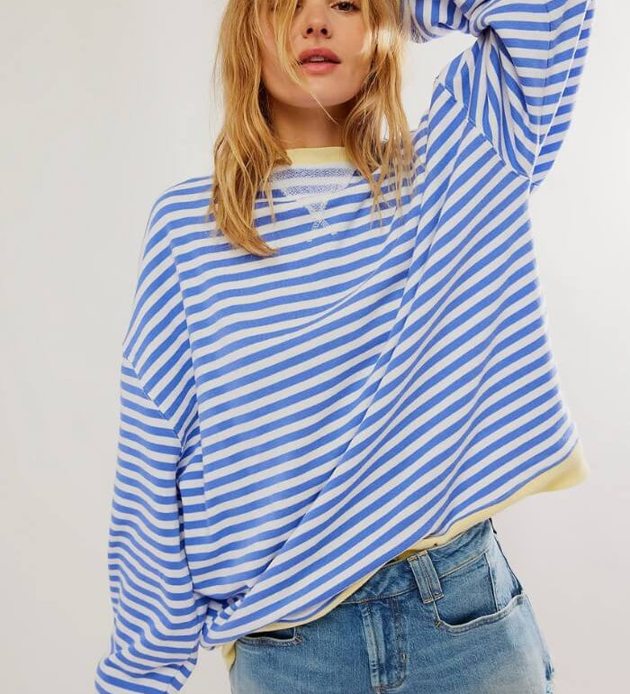 Light blue and white striped relaxed pullover with long sleeves, crew neck