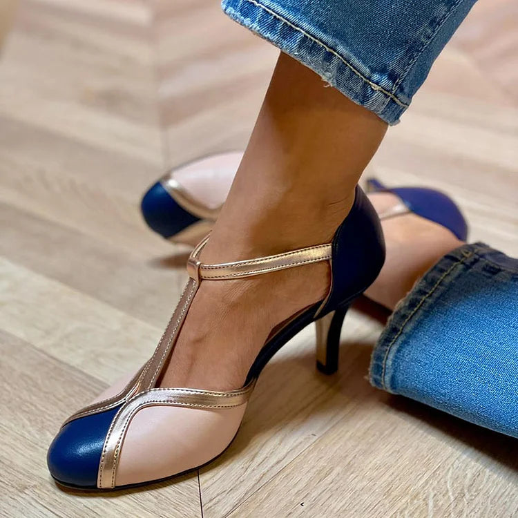 Two-tone T-bar pumps in dark blue with white trim and a slim high heel