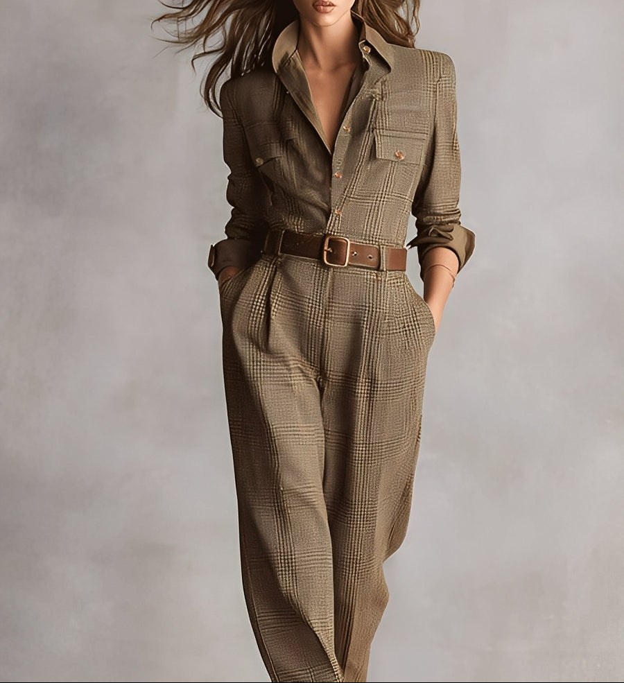 Women’s brown plaid overalls with buttoned collar, long sleeves, and belt