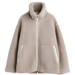 Light taupe sherpa zip-up winter jacket with high collar and two front flap pockets
