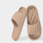All-season slippers, light beige open-toe slip-on with textured footbed and wide strap