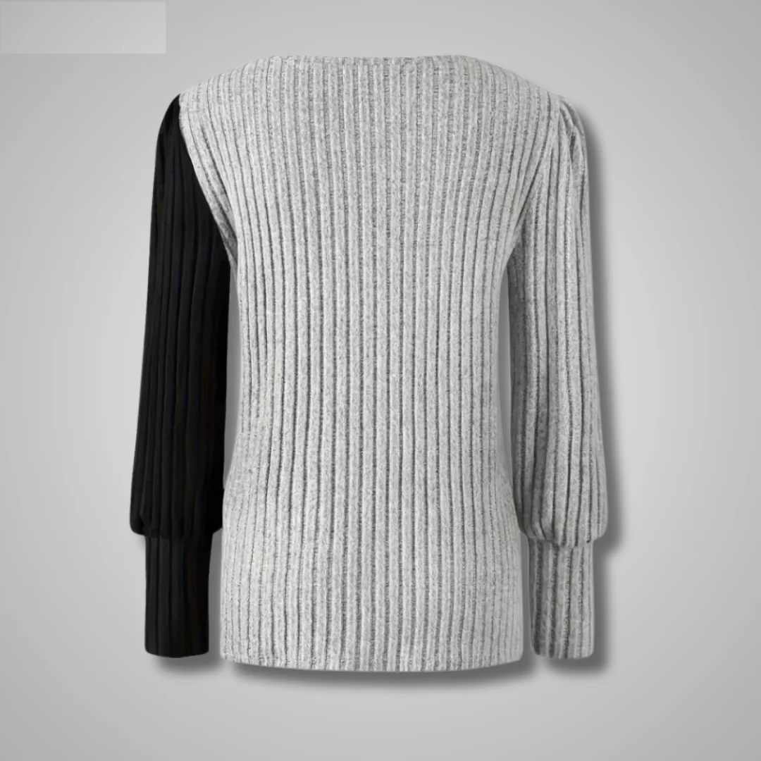 Back view of ivory ribbed knit top with long sleeves and rounded neckline