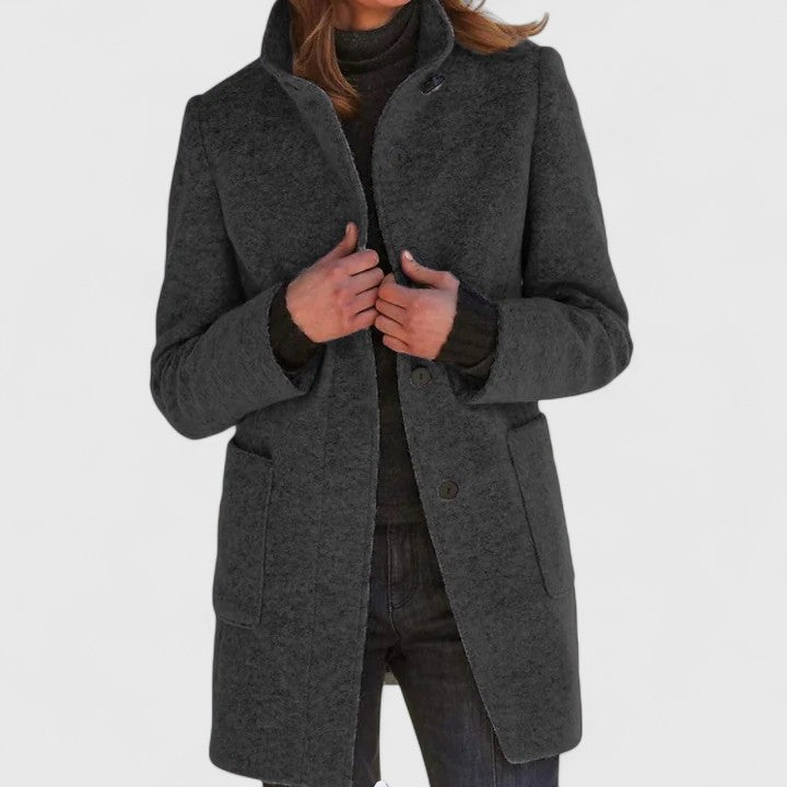 Dark gray classic button-front coat with notch lapels, long sleeves, and side pockets