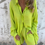 Casual button-up shirt and matching shorts set, lime green, front view with pockets