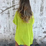 Casual button-up shirt and matching shorts set, lime green, back view