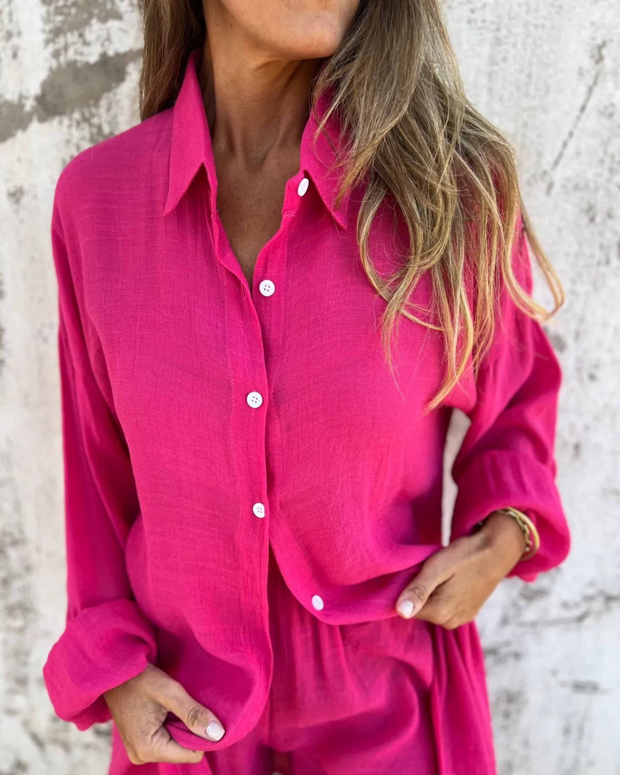 Casual button-up shirt and matching shorts set, fuchsia pink, open neckline detail