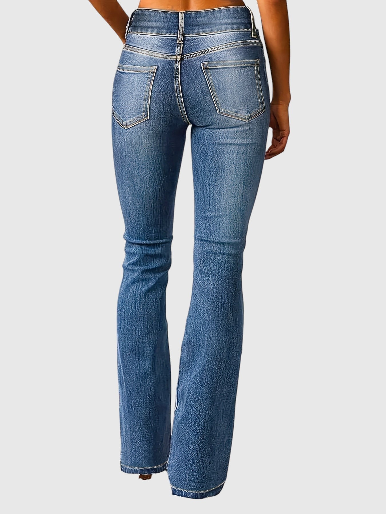 High-waisted slim-fit blue jeans, back view with patch pockets and belt loops