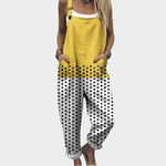 Loose yellow overalls with polka dot print, adjustable straps and wide legs
