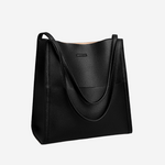 Black textured shoulder bag with curved front seam and top handles