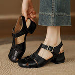 Amaya leather sandals, black with wide cross straps and square metal buckle