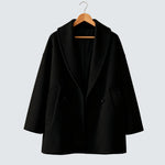 Black tweed-look wool coat with wide lapels, two front buttons, flap side pockets