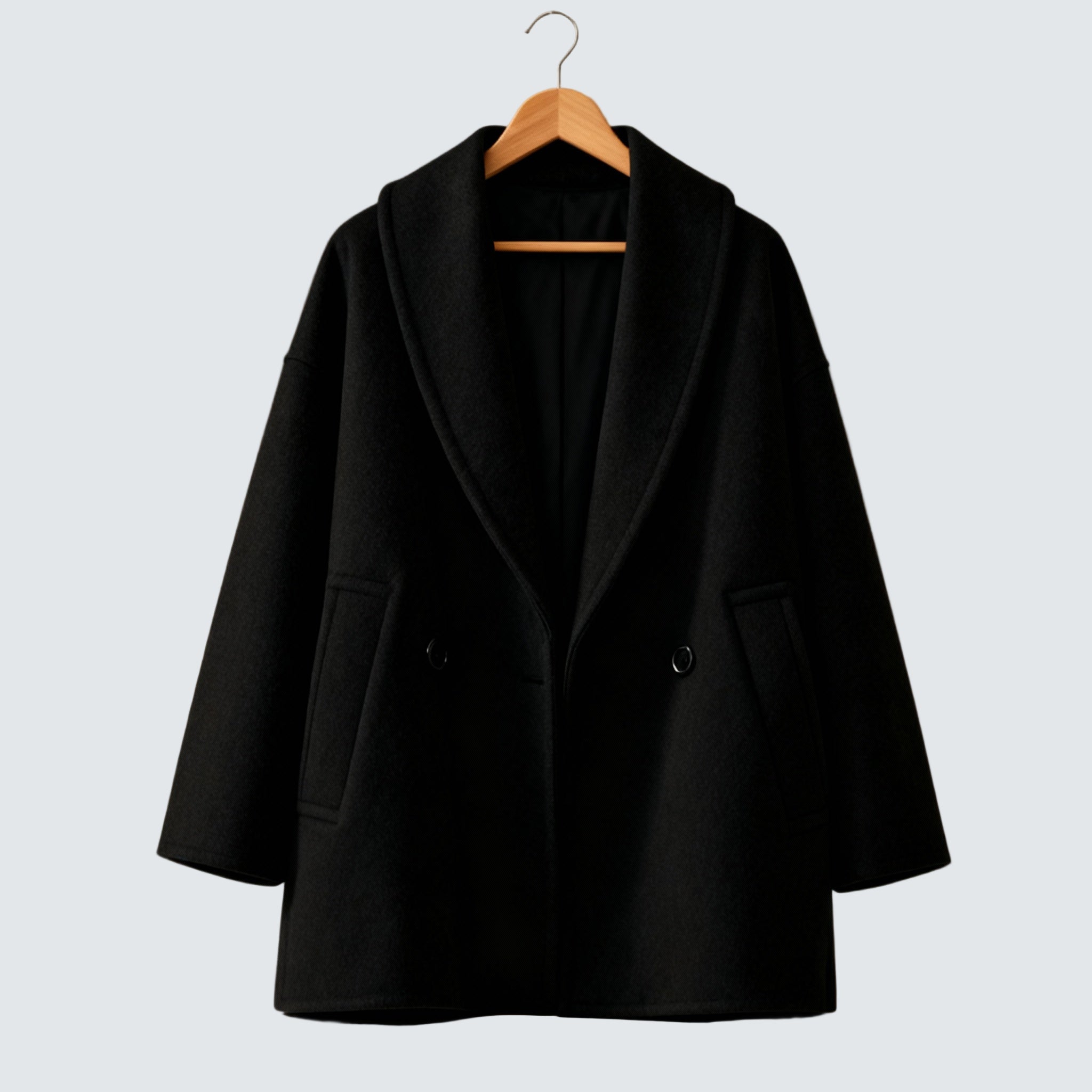 Black tweed-look wool coat with wide lapels, two front buttons, flap side pockets