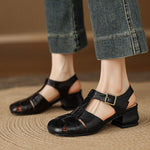 Black natural leather sandals with buckle strap and low block heel