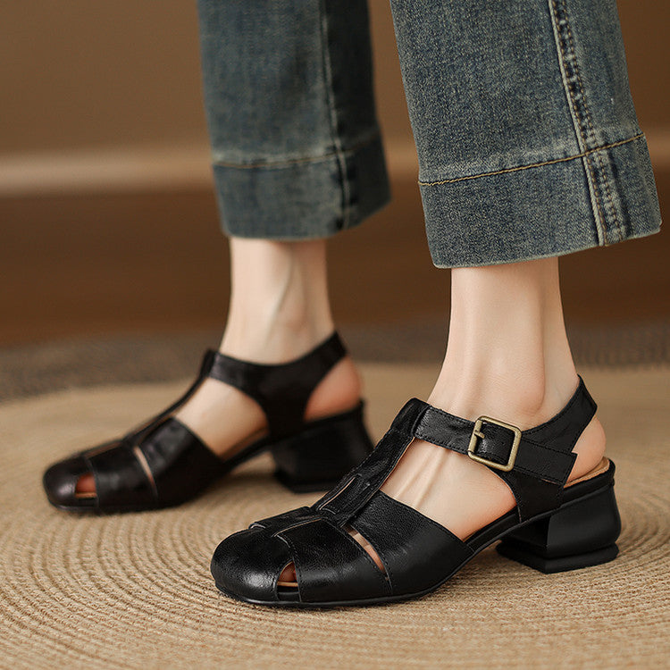 Black natural leather sandals with buckle strap and low block heel