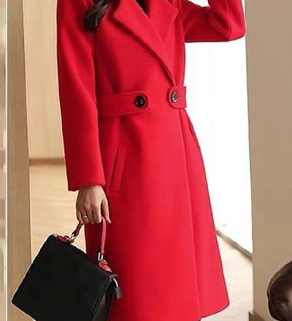 Red winter coat with notch lapels, double buttons, and waist belt
