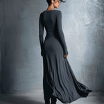 Charcoal gray maxi silk dress, back view, with draped knot waist detail