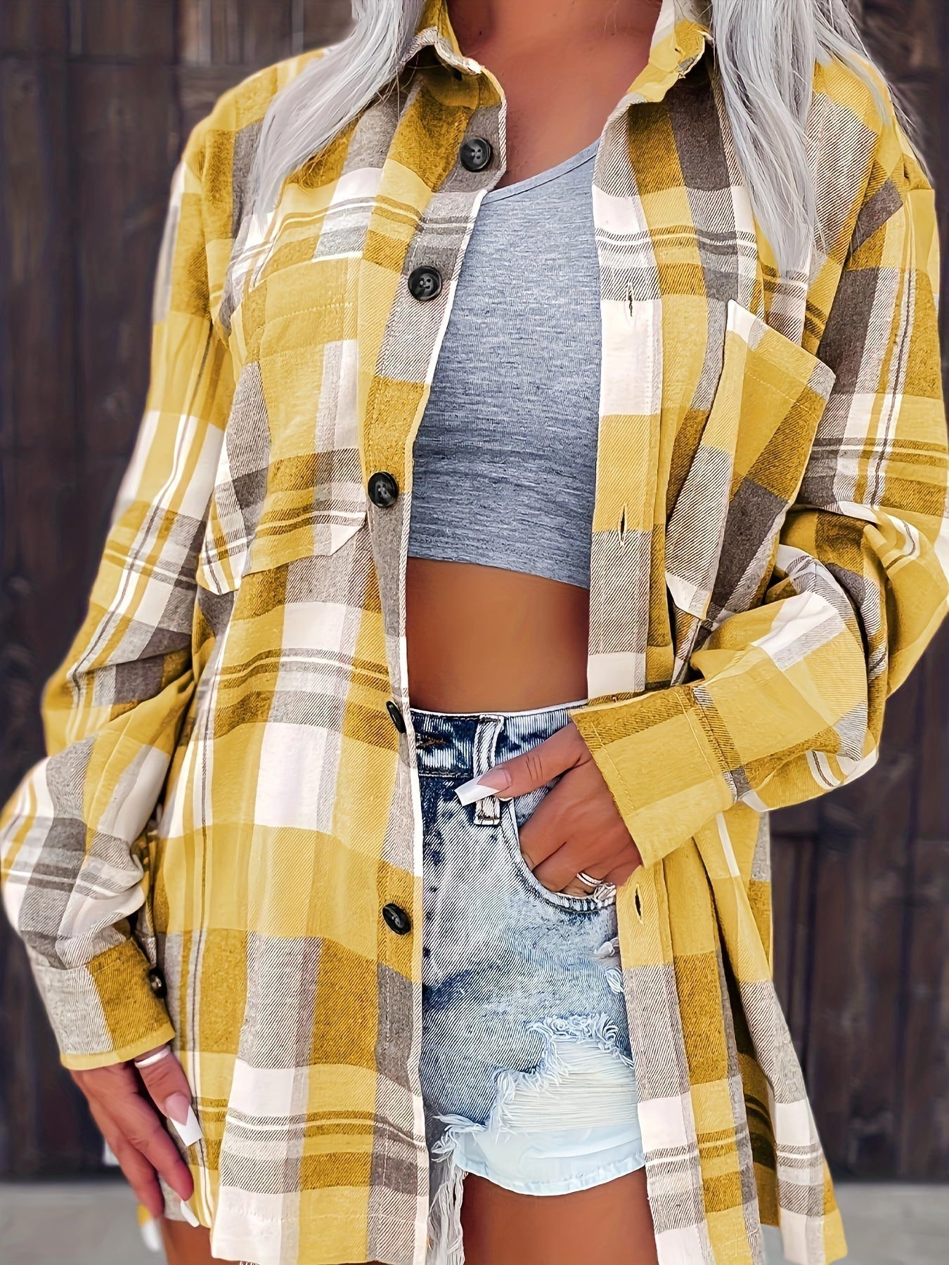 Yellow plaid long-sleeve button-up shirt with folded sleeves and chest pockets