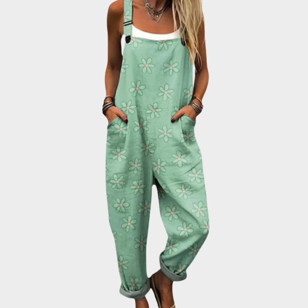 Loose green floral print overalls with adjustable straps and front bib