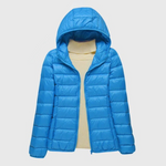 Lightweight puffer jacket with hood, bright blue zip front, ribbed knit hem