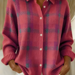 Pink plaid knit cardigan with button-front, V-neck collar, long sleeves.