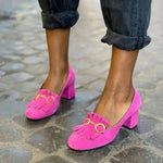 Hot pink suede heeled clog with gold-tone buckle detail and block heel