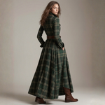 Green plaid belted maxi shirt dress with long sleeves and flared skirt, back view