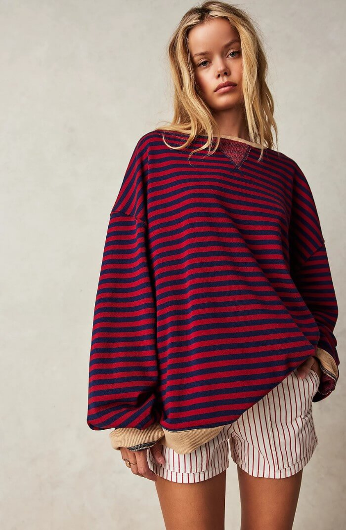 Burgundy and navy striped relaxed pullover with long sleeves, crew neck