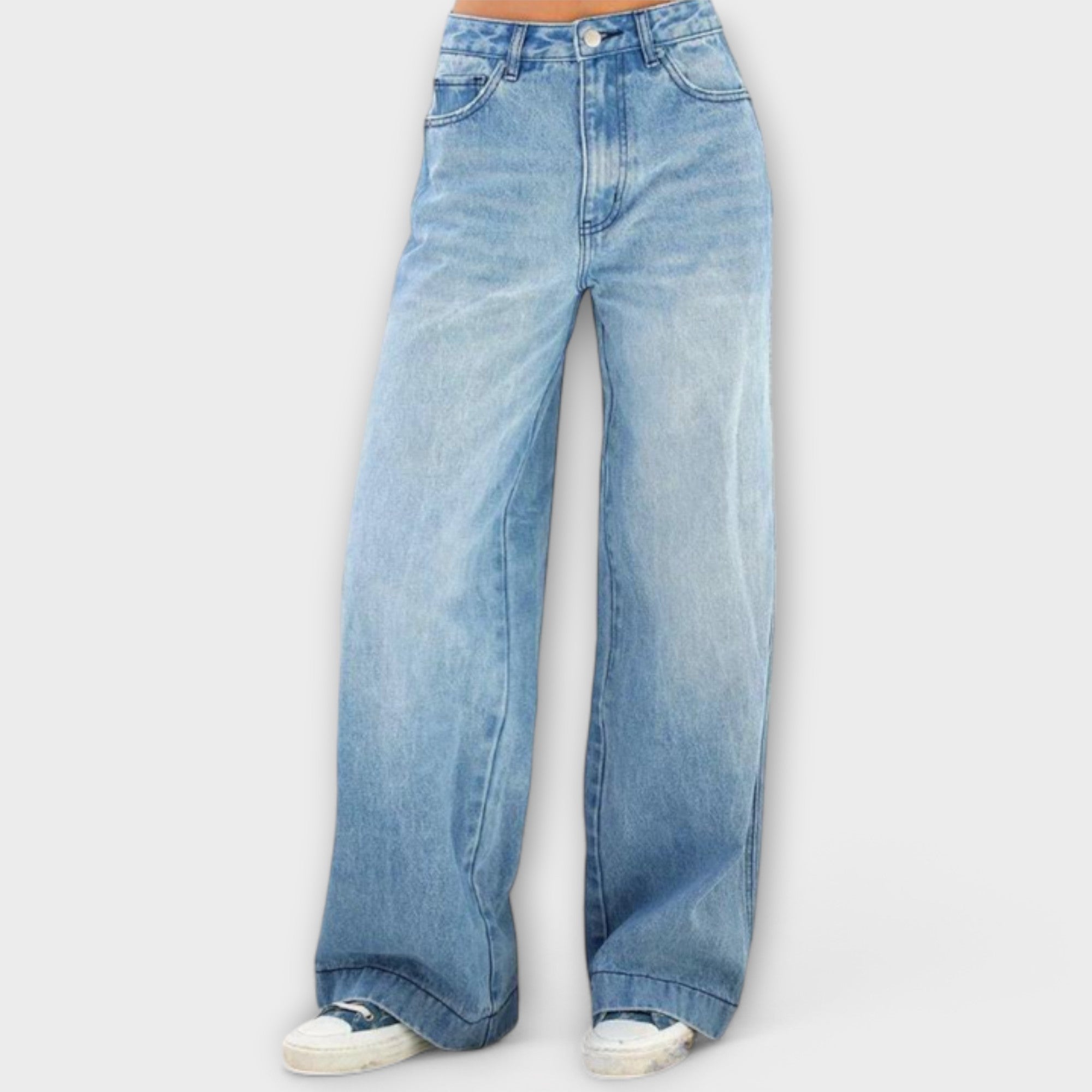 Women's light-wash wide-leg denim jeans with button waistband and relaxed straight leg