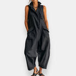 Black sleeveless jumpsuit with chest pocket and roomy relaxed legs