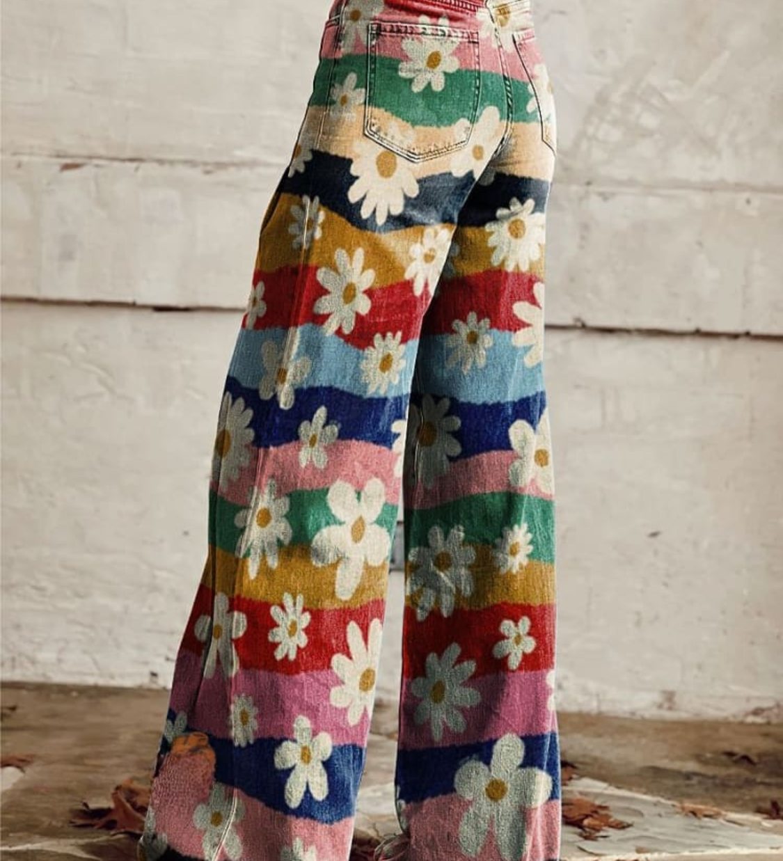 High-waist wide-leg boho pants with multicolor floral patchwork and frayed hems