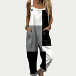 Loose printed overalls with sleeveless straps and black/white/gray abstract front