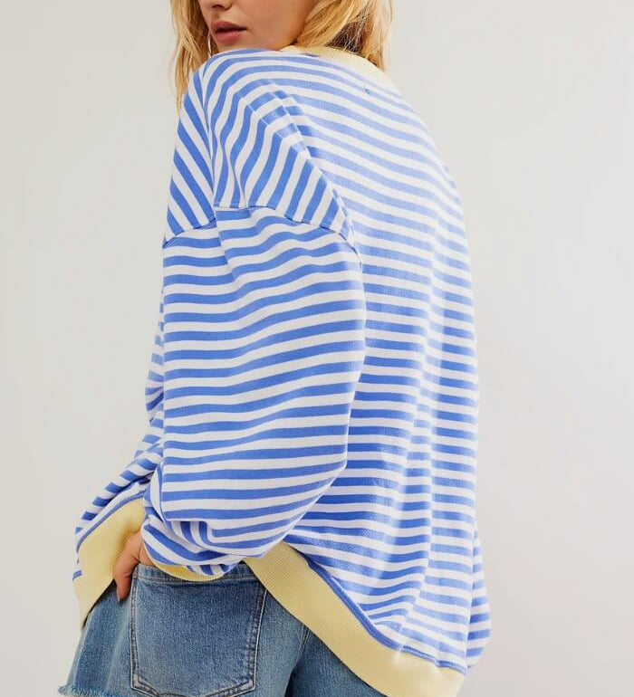 Light blue and white striped relaxed pullover with long sleeves, crew neck