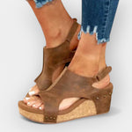 Brown suede platform wedge sandals with ankle cutout and open toe