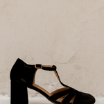 Black suede T-strap heeled sandal with buckled ankle strap