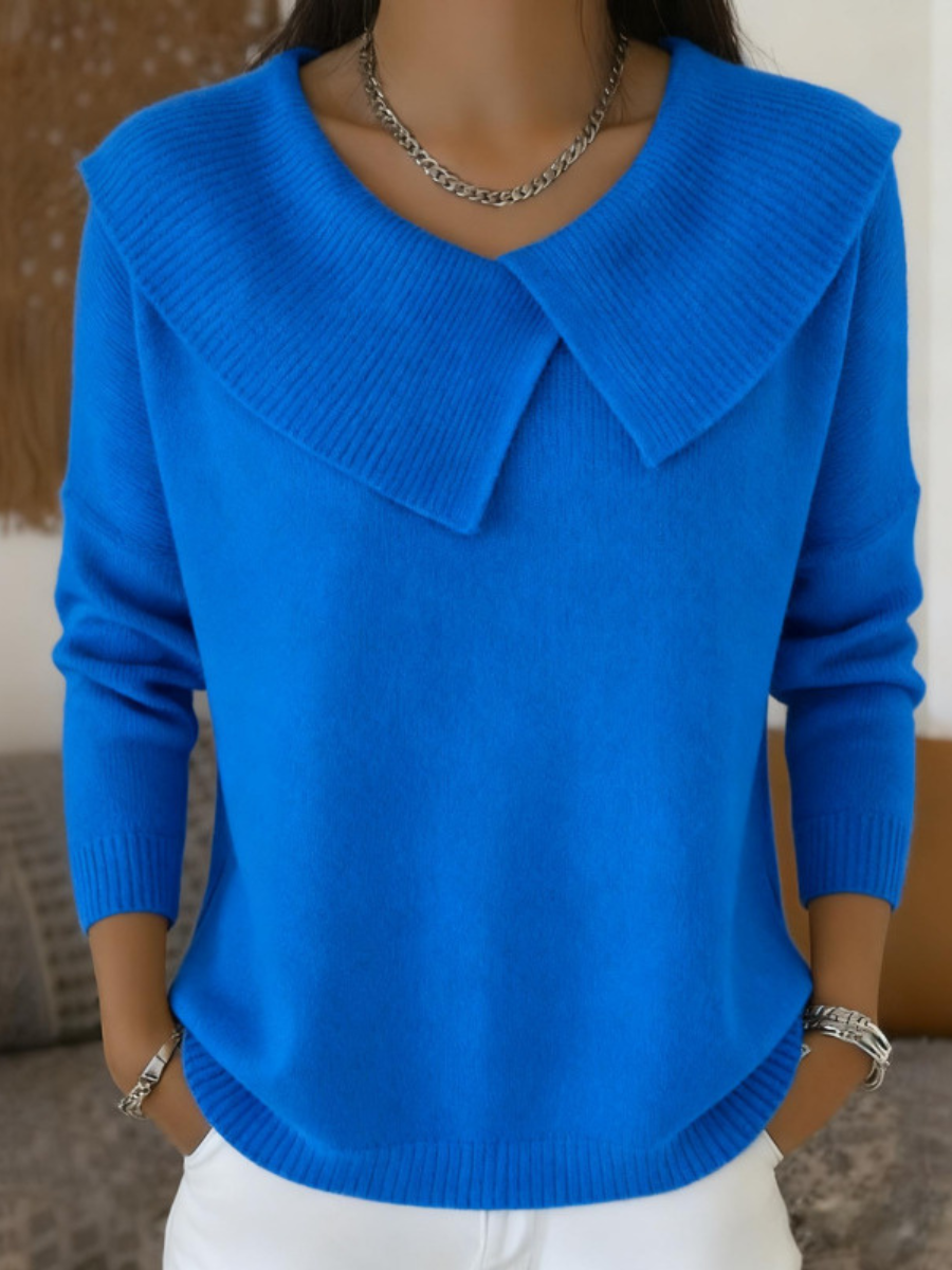 Blue knit sweater with soft fold-over collar and V-neck, long sleeves