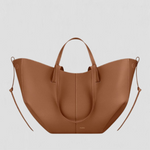 Large brown tote bag with top handles and side loop straps, curved open shape
