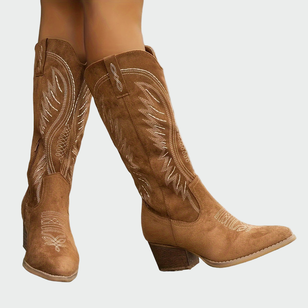 Brown suede mid-calf western boots with decorative stitched embroidery and block heel