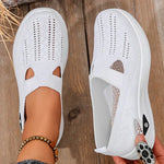 White orthopedic knit slip-on sneakers with breathable toe cutouts and white rubber sole