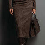 Brown fitted midi dress with turtleneck and long sleeves, paneled seams, suede-look