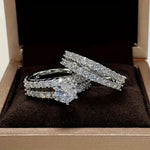 Eternal Brilliance ring set with round center stone and pavé bands