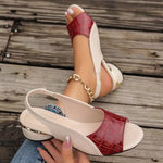 Orthopedic slide sandals with red croc-texture strap, white sole, and chunky heeled back