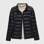 Lightweight puffer jacket with hood, black, full-zip front and quilted panels