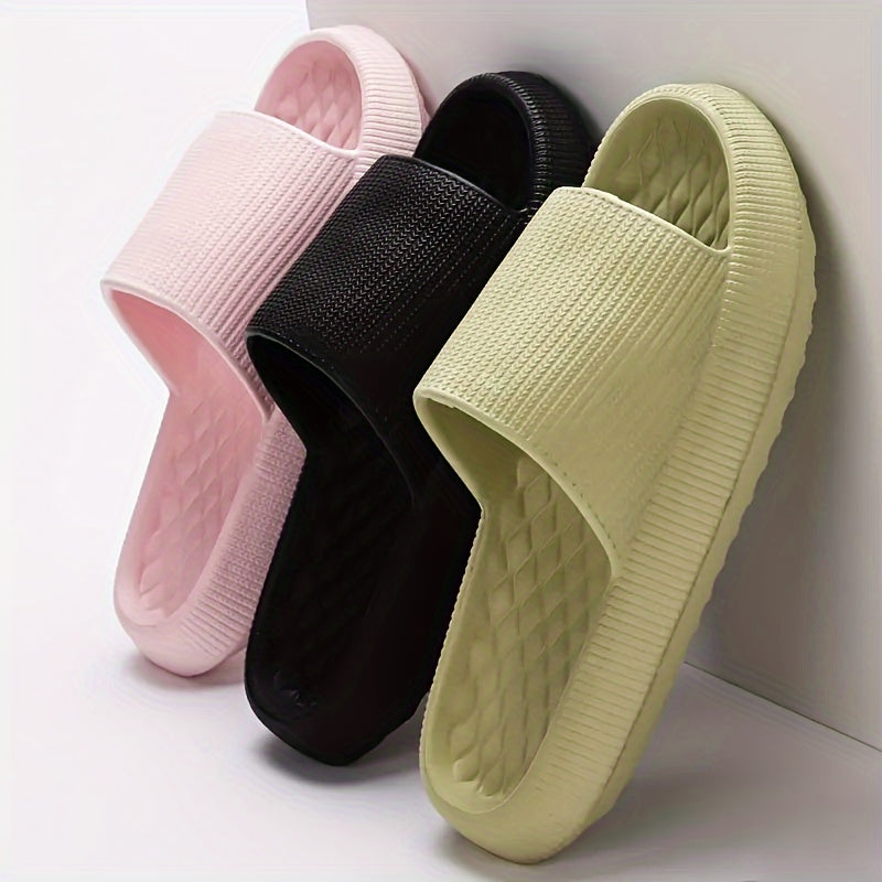 Summer slip-on sandals with thick sole, ribbed straps in pink, black, and pale green.