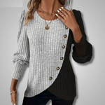 Light gray ribbed knit top, long sleeves, button-front asymmetric hem