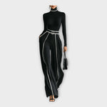 Women's black turtleneck jumpsuit with contrast piping, belted waist, full front