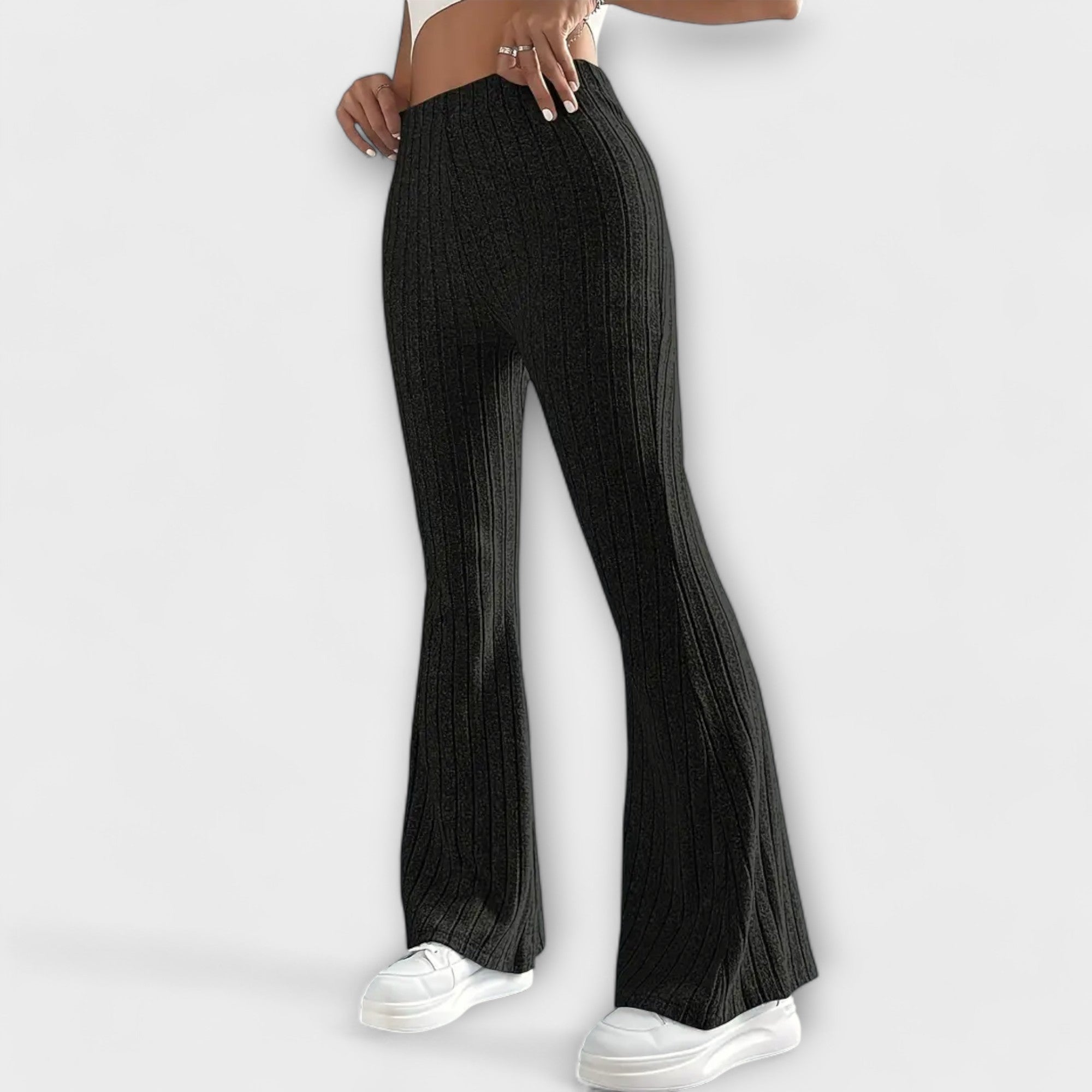 Black ribbed knit flared pants with high waist and wide leg opening